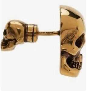 Alexander McQueen single earring. Gold Skull